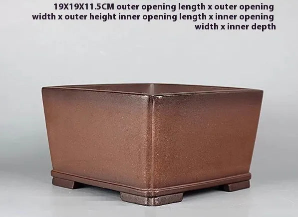 Brown antique handmade purple clay flower pot measuring 19x19x11.5 cm