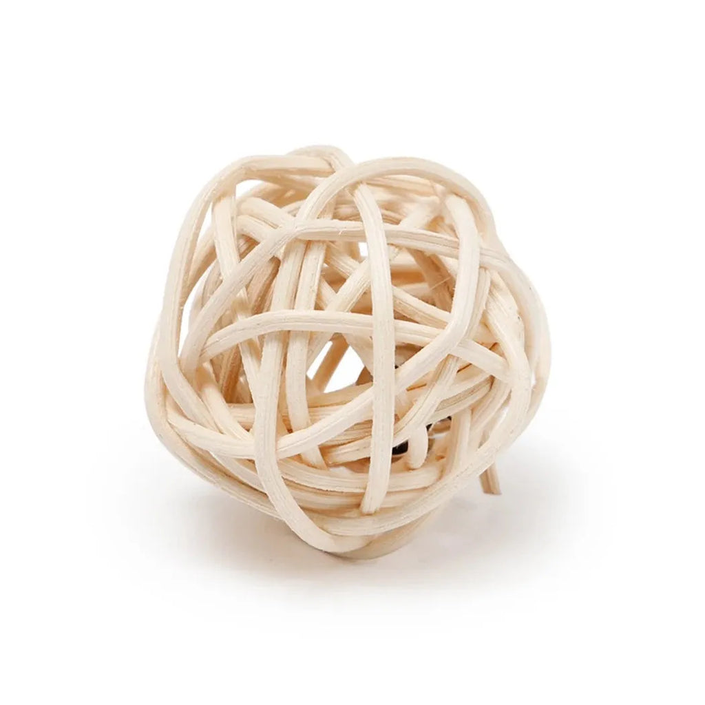 Two cat toys: a woven rattan ball and a faux feather ball with bell on a white background.
