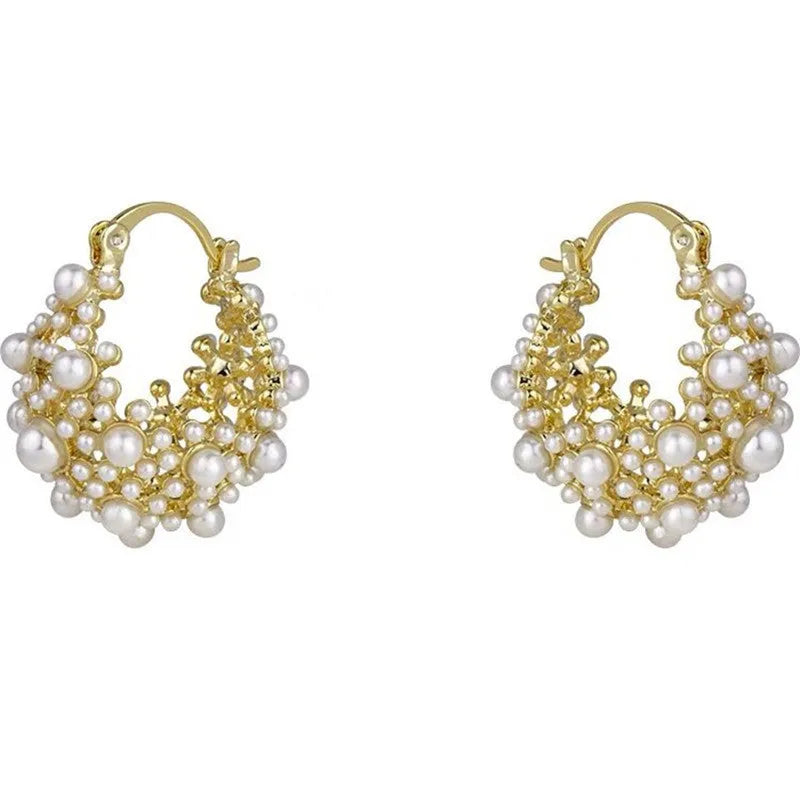 Gold-coloured copper flower basket earrings for women with small bead detailing and pearl inlay.