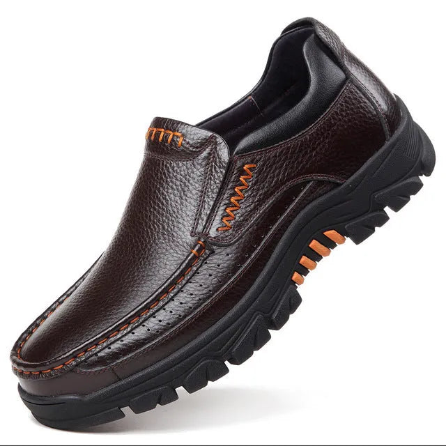 Men's black and brown business casual slip-on shoes made of cowhide leather with a rubber sole.