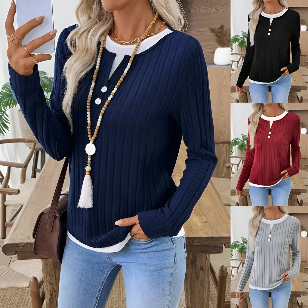 Women's black fake two-piece pullover sweater with round neck and button detail on concave stripe fabric