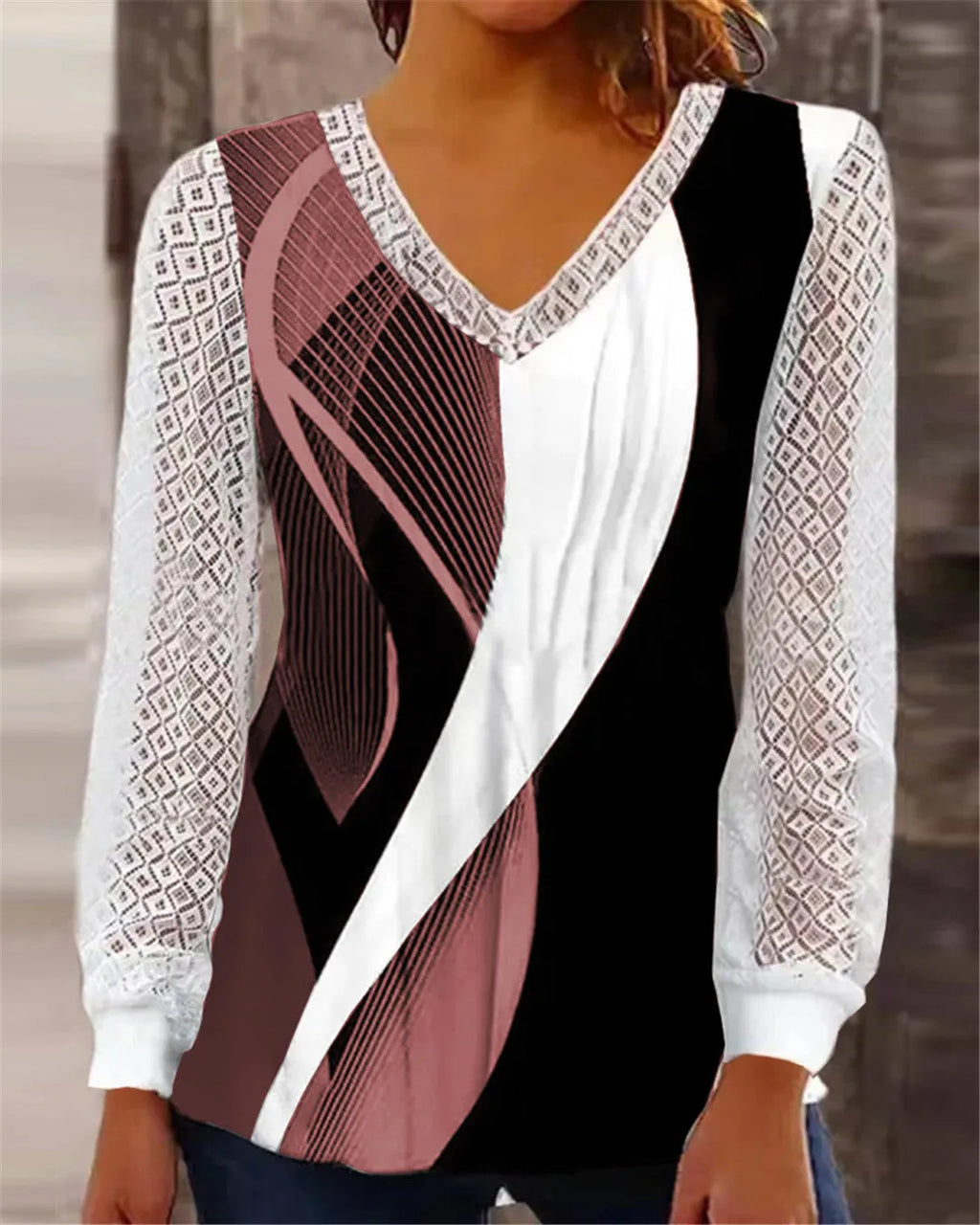 Purple loose V-neck women's top with long sleeves and a hollow-out lace print pattern.