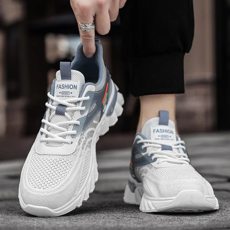 Men's white blue and black platform casual sports running shoes with mesh upper and cross straps.