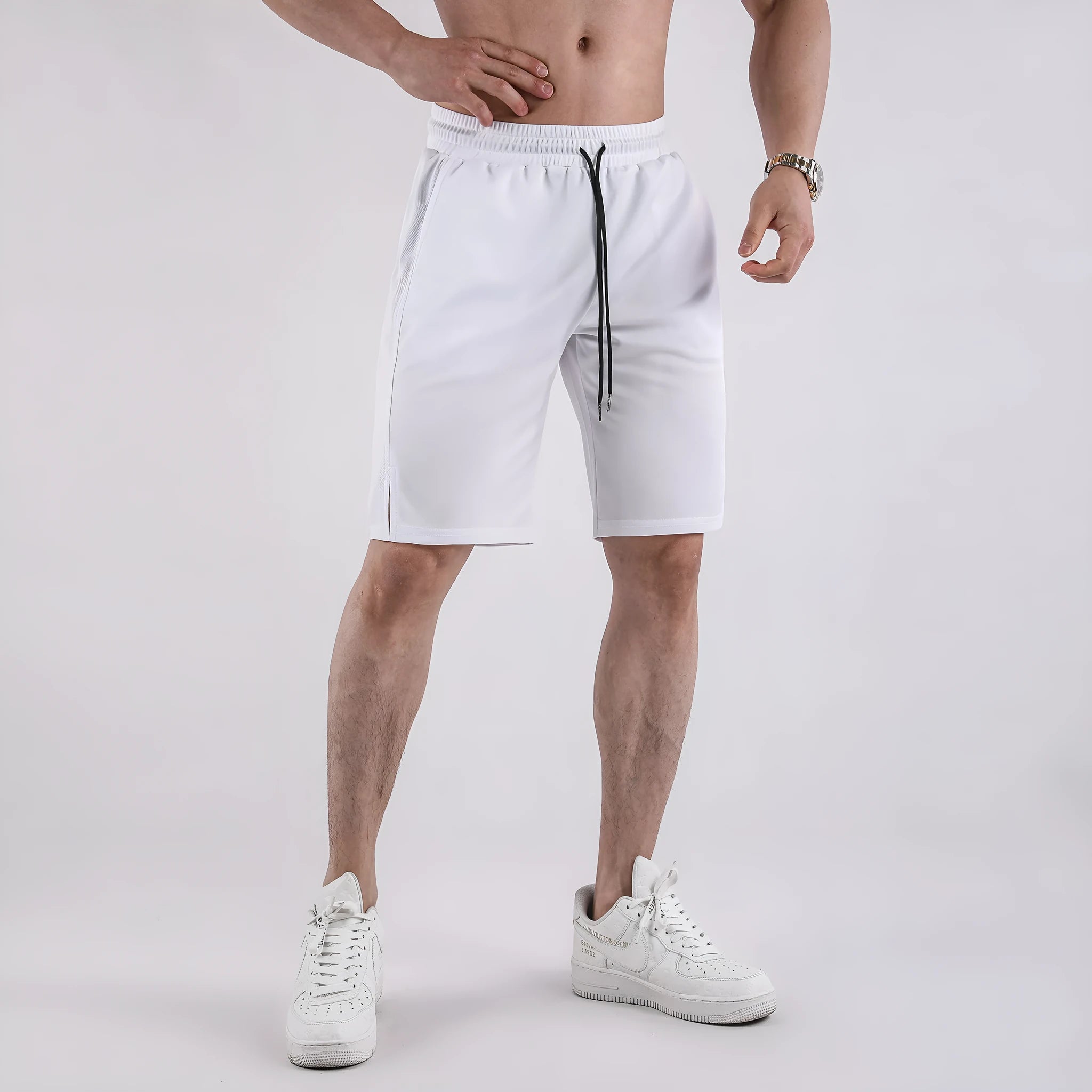 Men's black quick-drying mesh shorts with elastic waist and fifth pants length