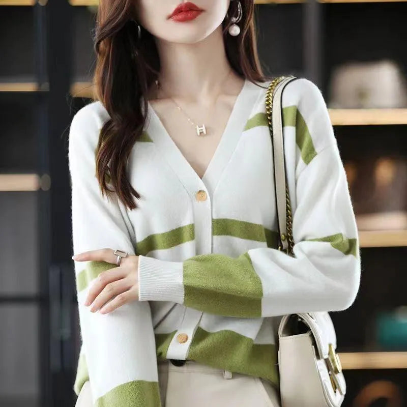 Women's slim fit V-neck cardigan with 3D striped pattern and buttons in four colour options.