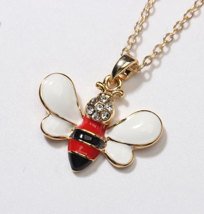 Cartoon bee drop pendant necklace on alloy cross chain for women, available in coffee, yellow, red colours