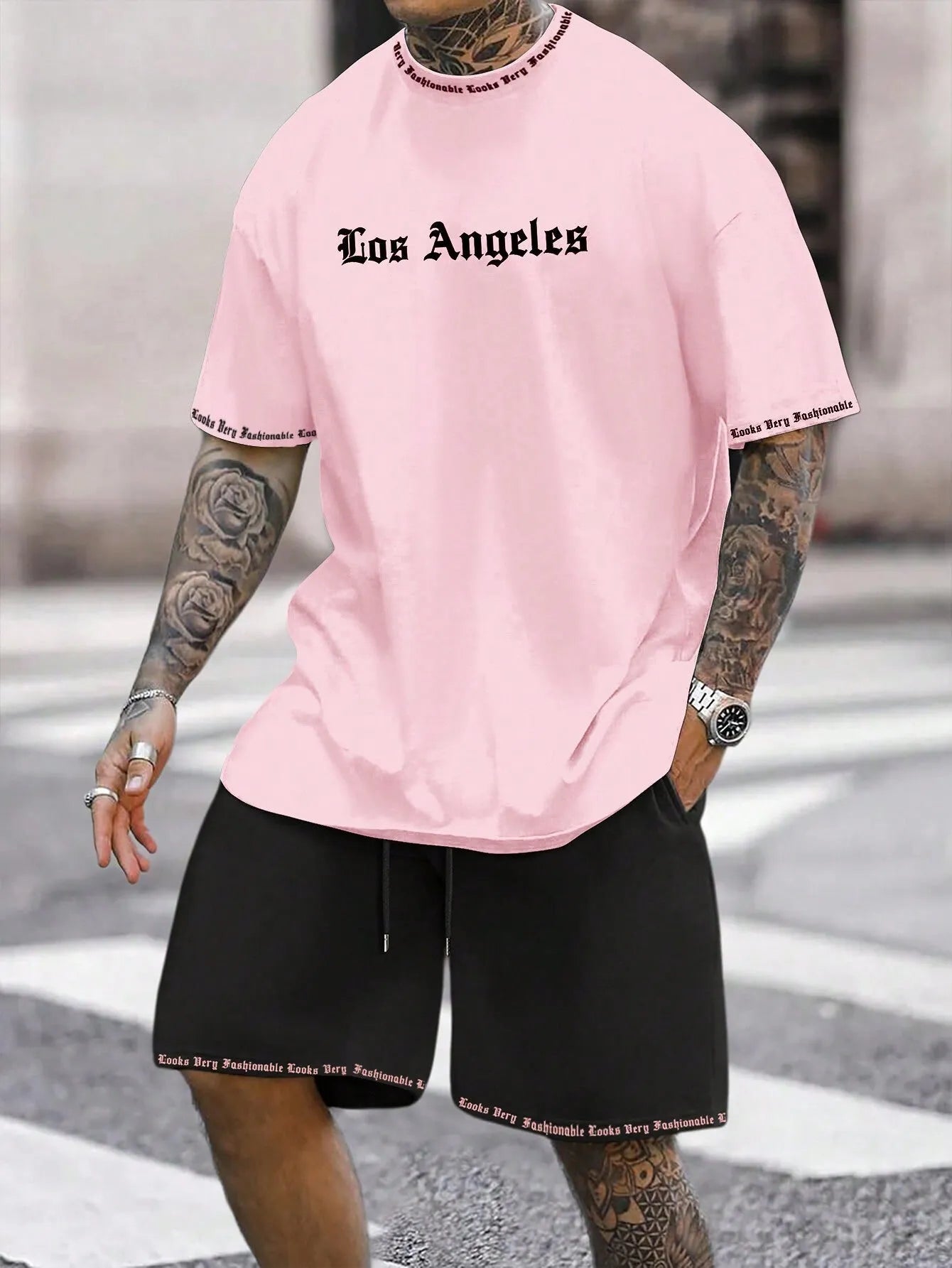 Men's quick-dry polyester sportswear set showing short-sleeved top and matching shorts in a solid colour.
