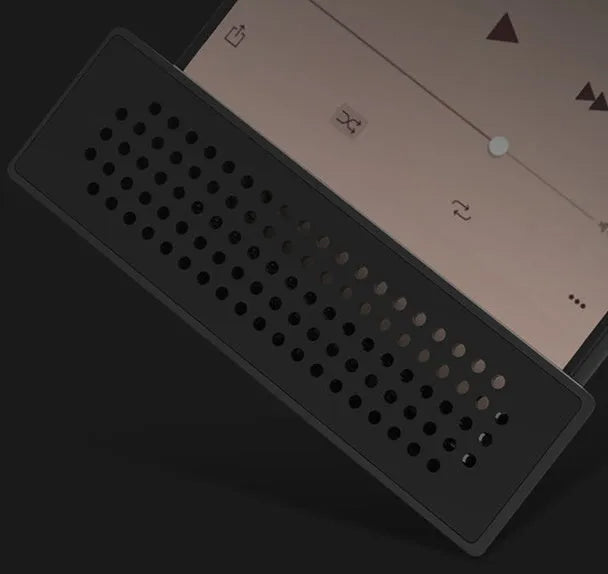 Portable black ABS plastic mobile phone amplifier bracket holding an iPhone in horizontal position.