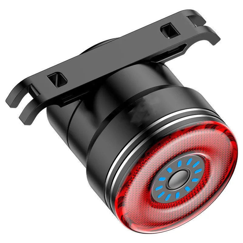 Black aluminium alloy smart brake sensing USB rechargeable bicycle taillight showing compact design.