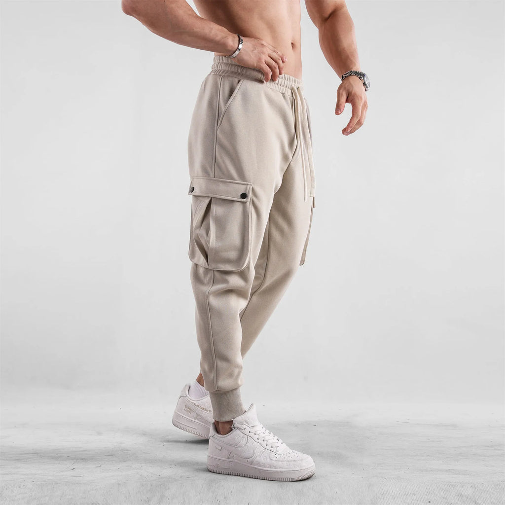 Men's loose cotton sports trousers with multi-pockets and ankle-tied cuffs in six colour options