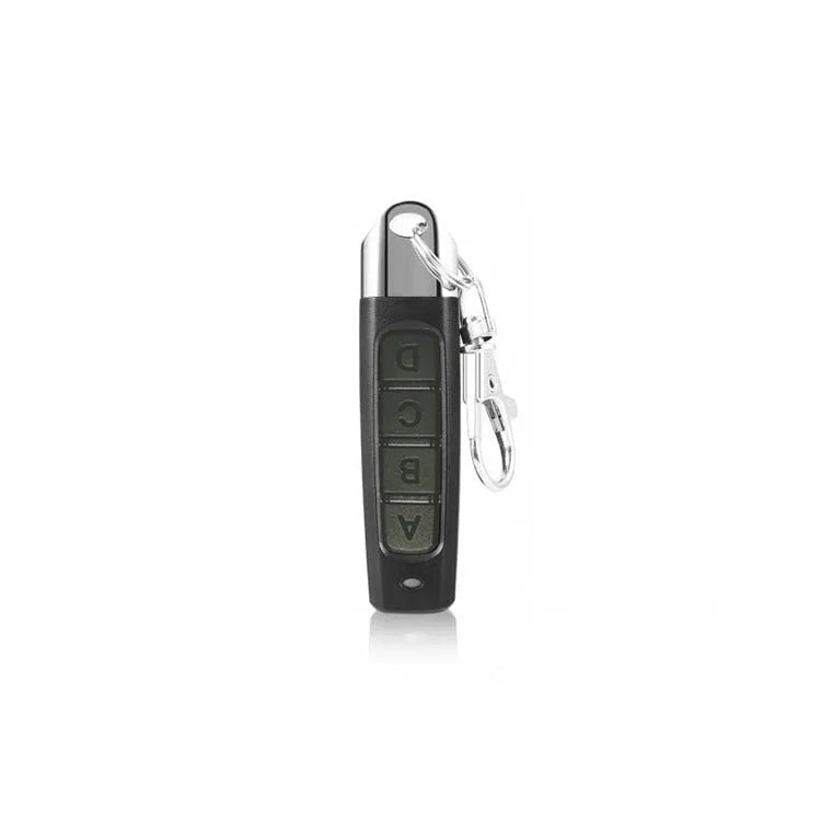 433MHz rolling door remote control in black showing compact 6.7cm design with programming buttons