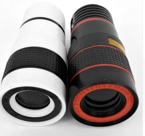 Black 12x mobile phone telescope lens with clip extended next to smartphone