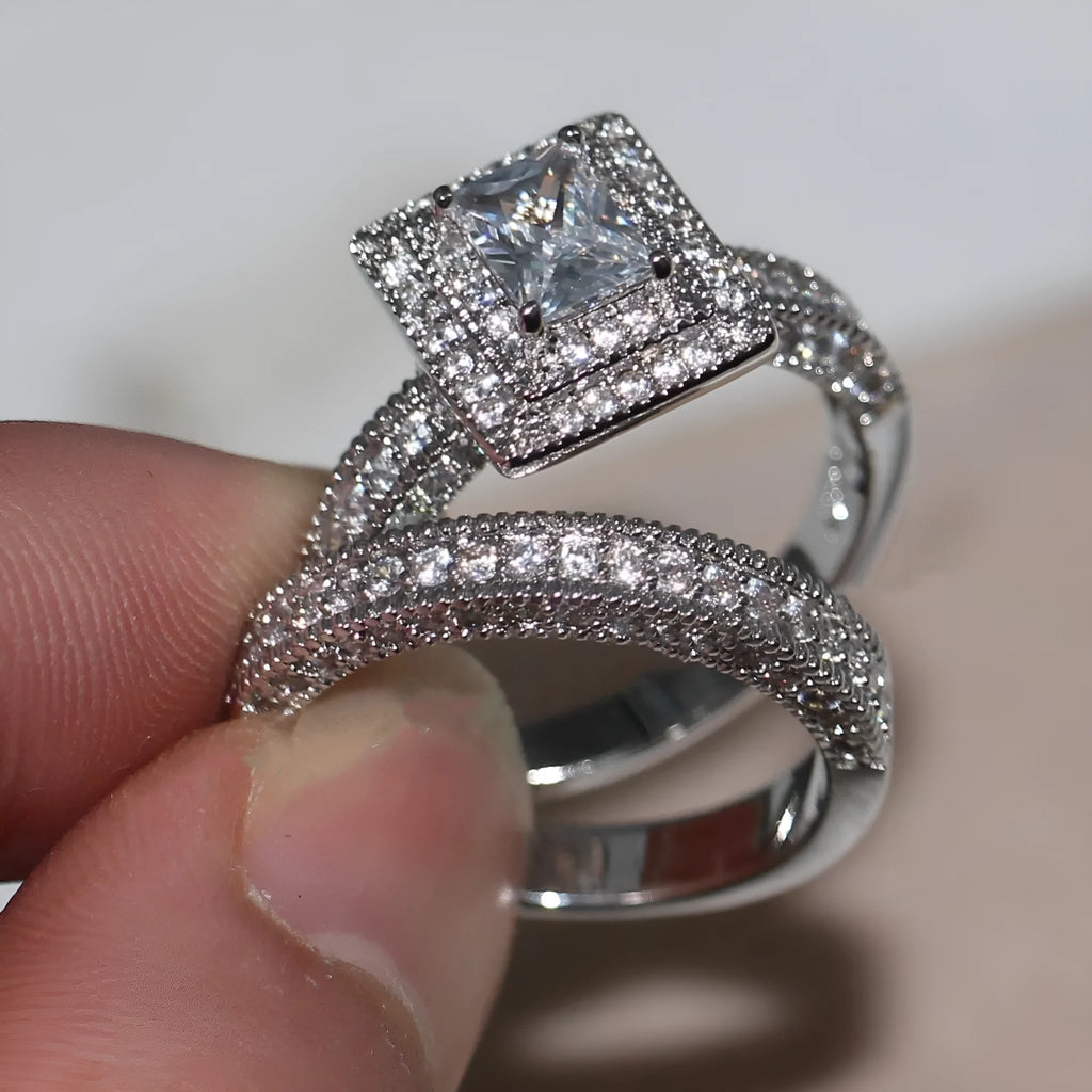 Silver zinc alloy double layer zircon ring on finger showing stacked design
