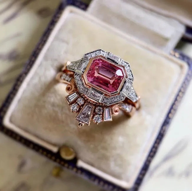 Rose gold geometric alloy women's ring with ruby detailing showing European retro style design