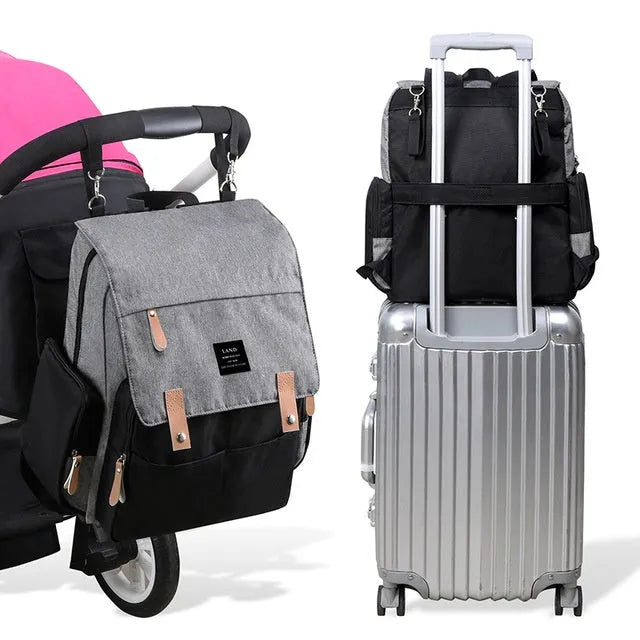 Land Mommy MPB86 grey diaper backpack with changing mat, showing main compartment and straps.