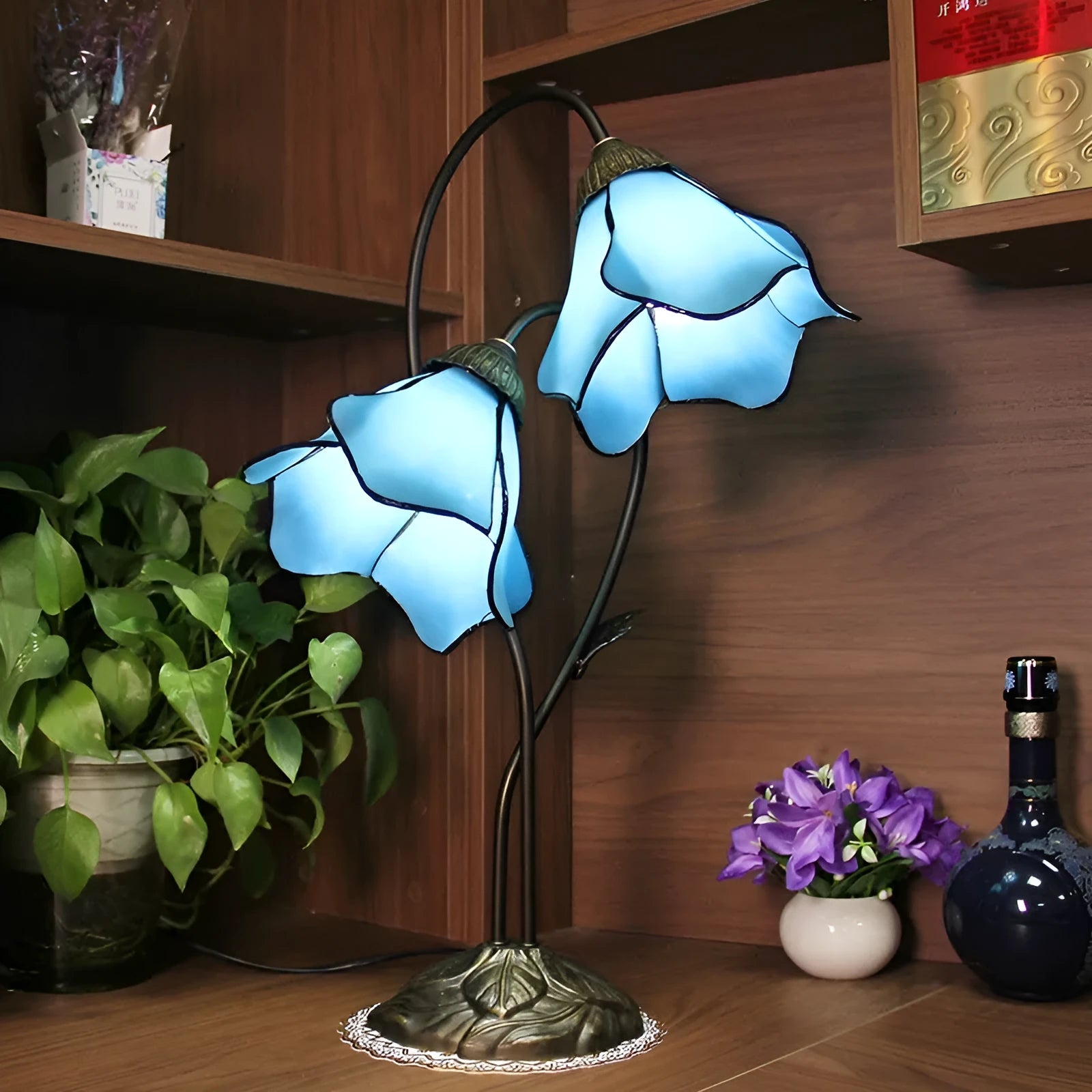 Retro American glass lotus desk lamp with double head pink shade on table