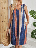 Sleeveless V-neck colour block striped dress with contrast colours, midi length with mid waist