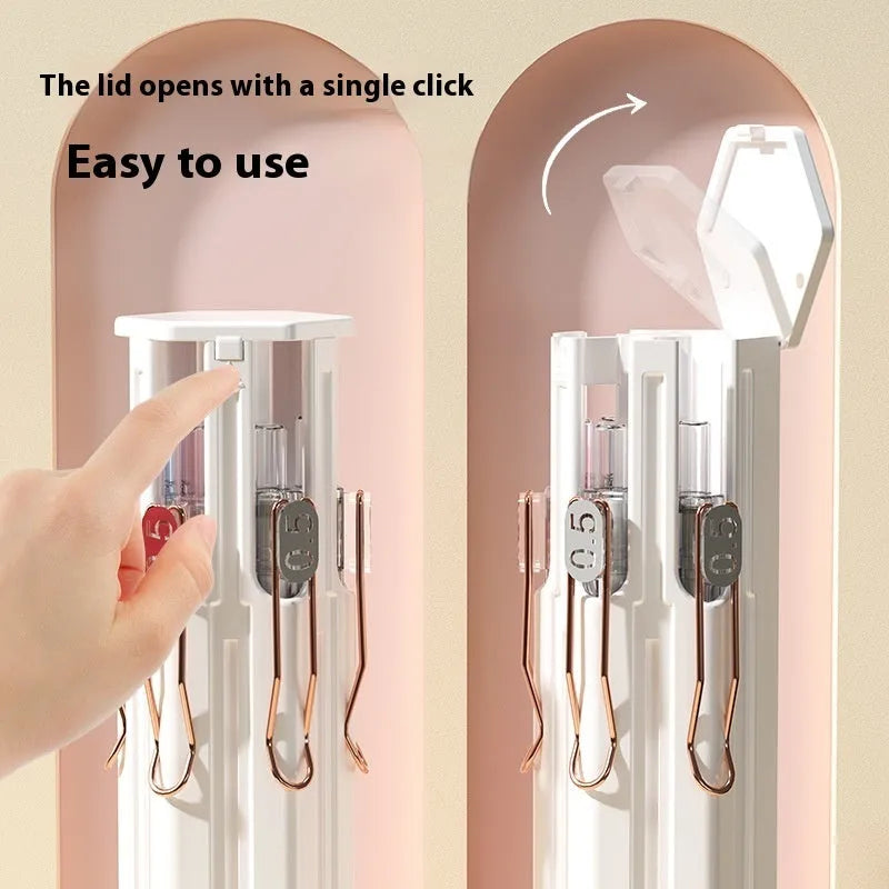 Plastic pressing pen for a six pen pencil box kit in a paper box