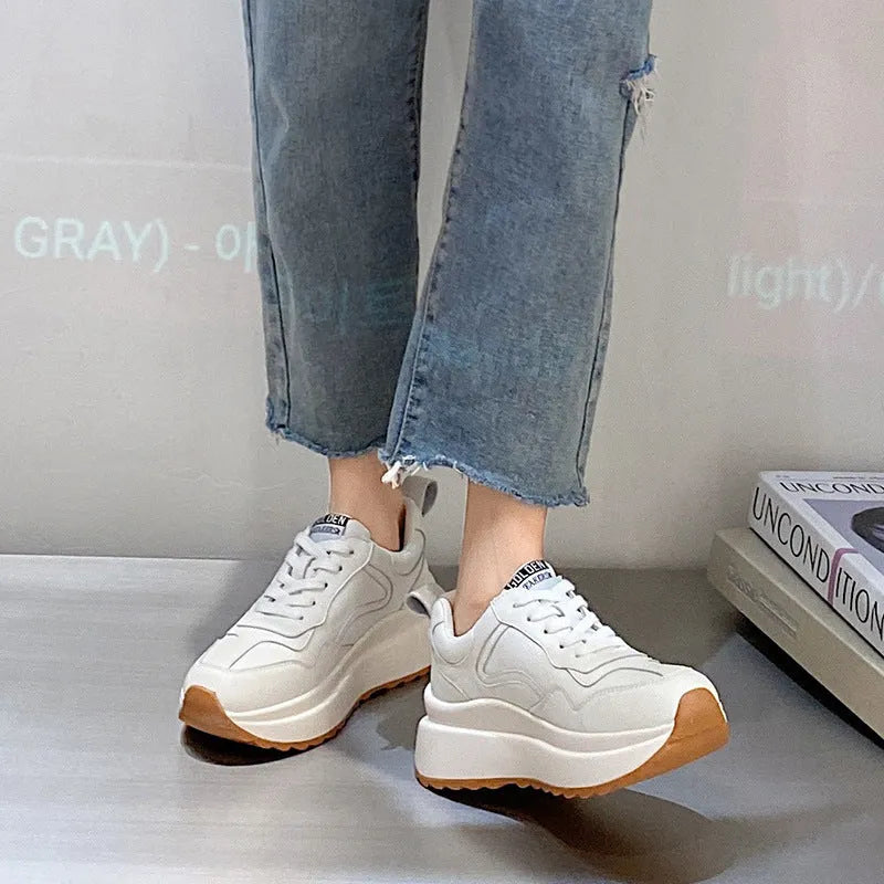 Beige women's low-top leather sports shoes with cross strap and English muffin heel