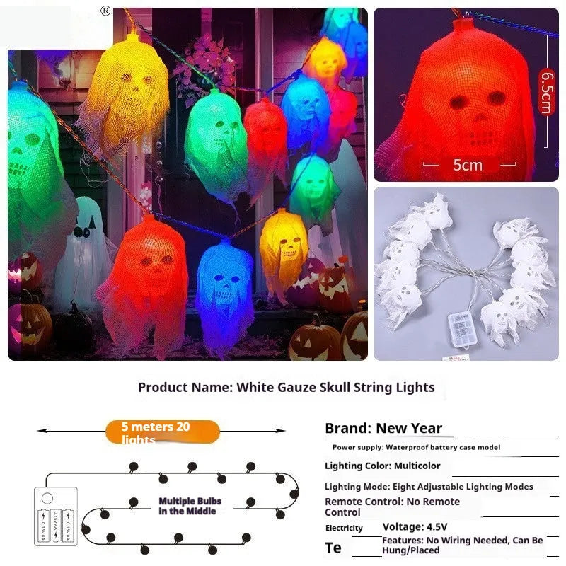 String of battery-powered coloured LED Halloween lights with plastic housing for indoor wall decoration.