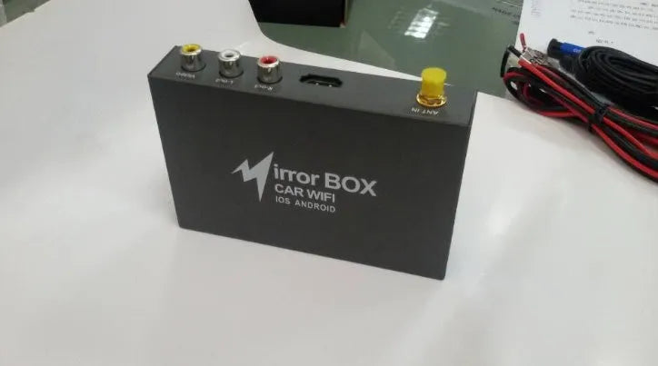 Black Car Mirror Link Box with Wi-Fi converter, power cable, antenna, AV cable, and manual.