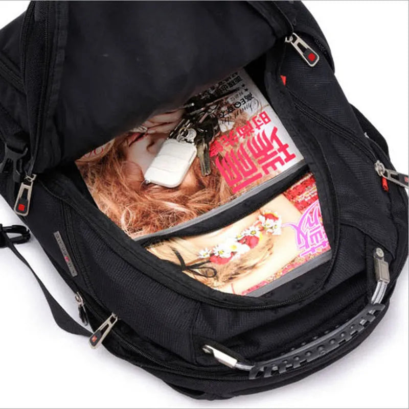 Black business computer backpack showing three compartments, open to reveal laptop sleeve and organiser pockets.