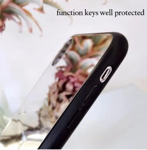 Black iPhone mirror phone case showing reflective surface on back, compatible with iPhone X and other models.