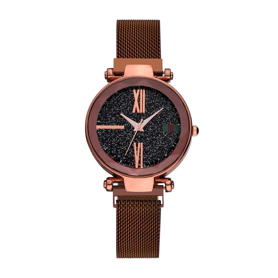 Ladies quartz watch with round 32mm dial and stainless steel jewellery clasp, shown in multiple colours.