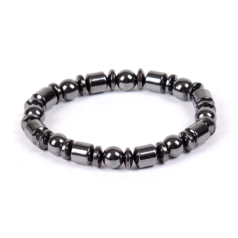 Black pentagram magnetic therapy bracelet with magnetite and hematite beads on wrist