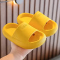Children's EVA slippers in mixed colours with non-slip soles showing size range 24-35