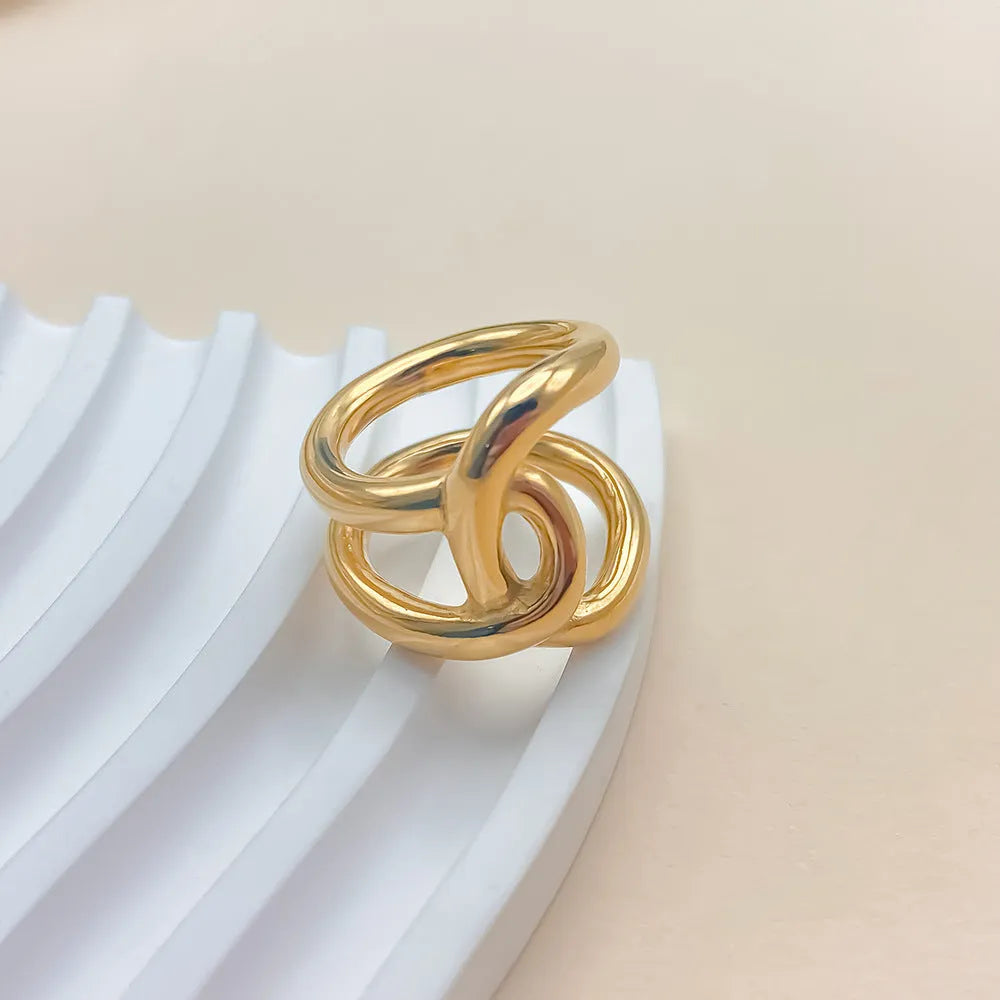 Women's adjustable knotted ring with geometric U-shape in stainless steel gold or silver colour
