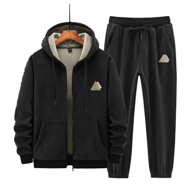 Grey cashmere hooded sweater and cotton pants casual sports suit set laid flat.