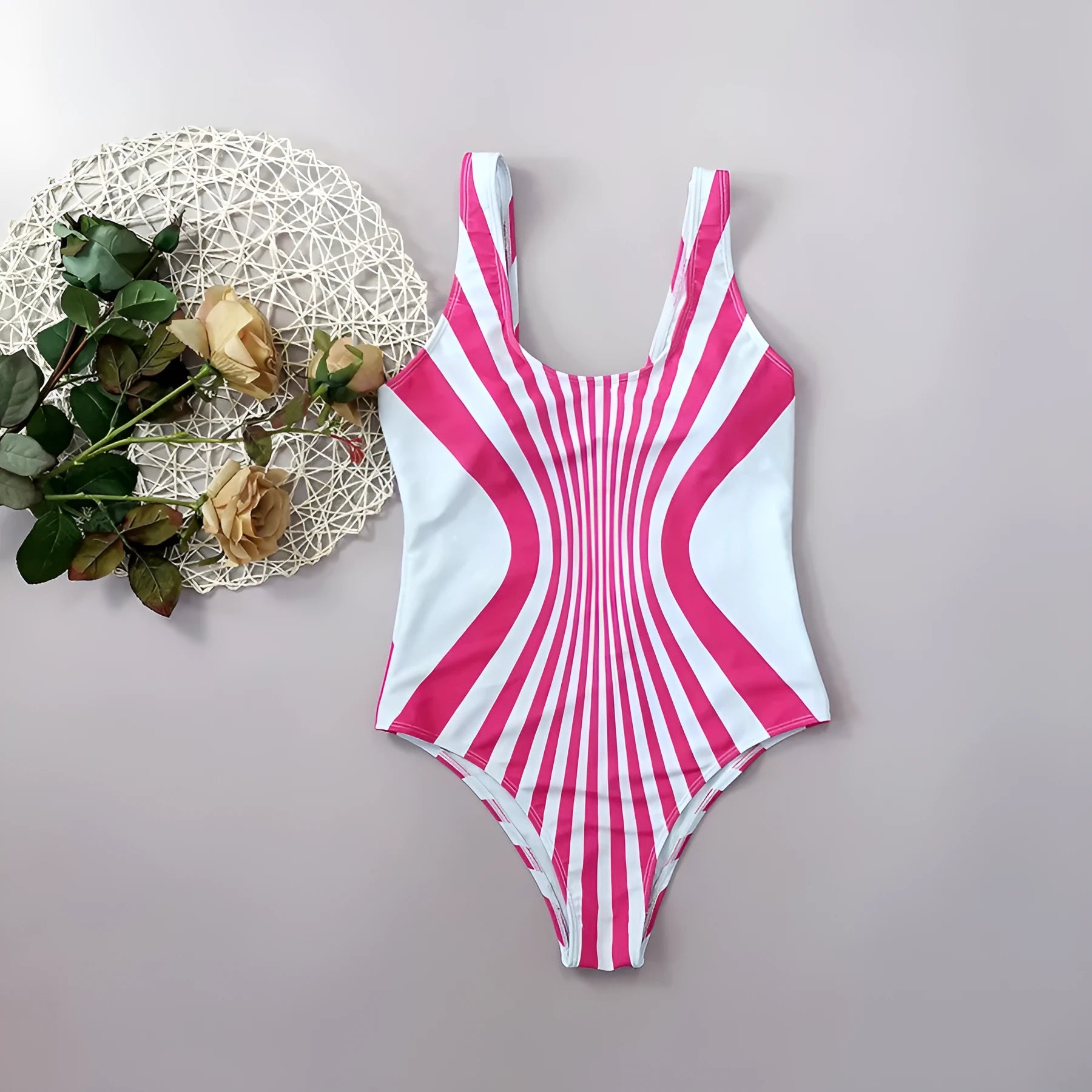 Women's pink striped one-piece swimsuit with front and rear digital print positioning