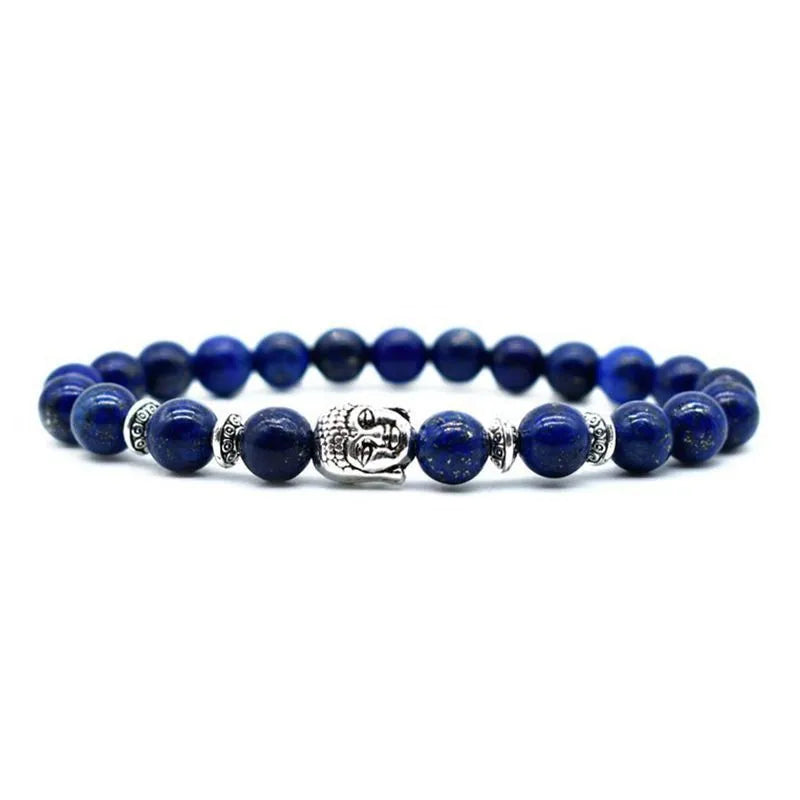 Unisex adjustable bracelet with a 19mm Buddha head charm in tiger eye stone.
