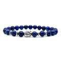 Unisex adjustable bracelet with a 19mm Buddha head charm in tiger eye stone.