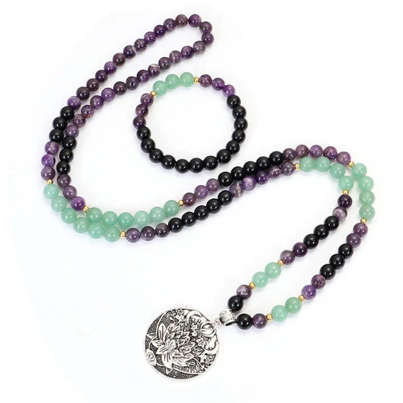 Handmade geometric lotus pendant necklace with stone bead chain and matching bracelet.