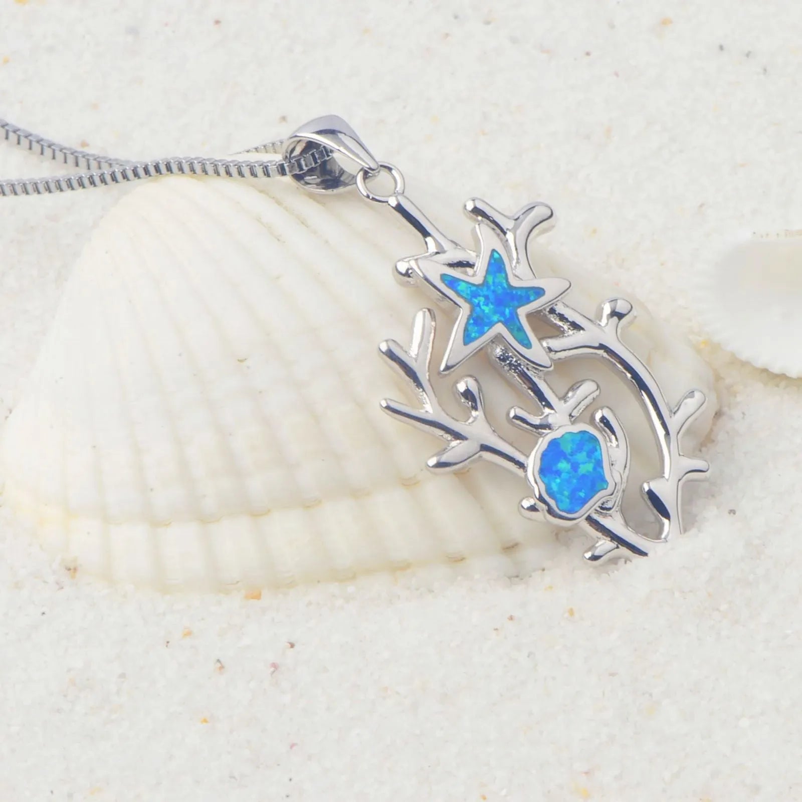 Blue sea cucumber pendant necklace on copper chain with electroplated blue finish