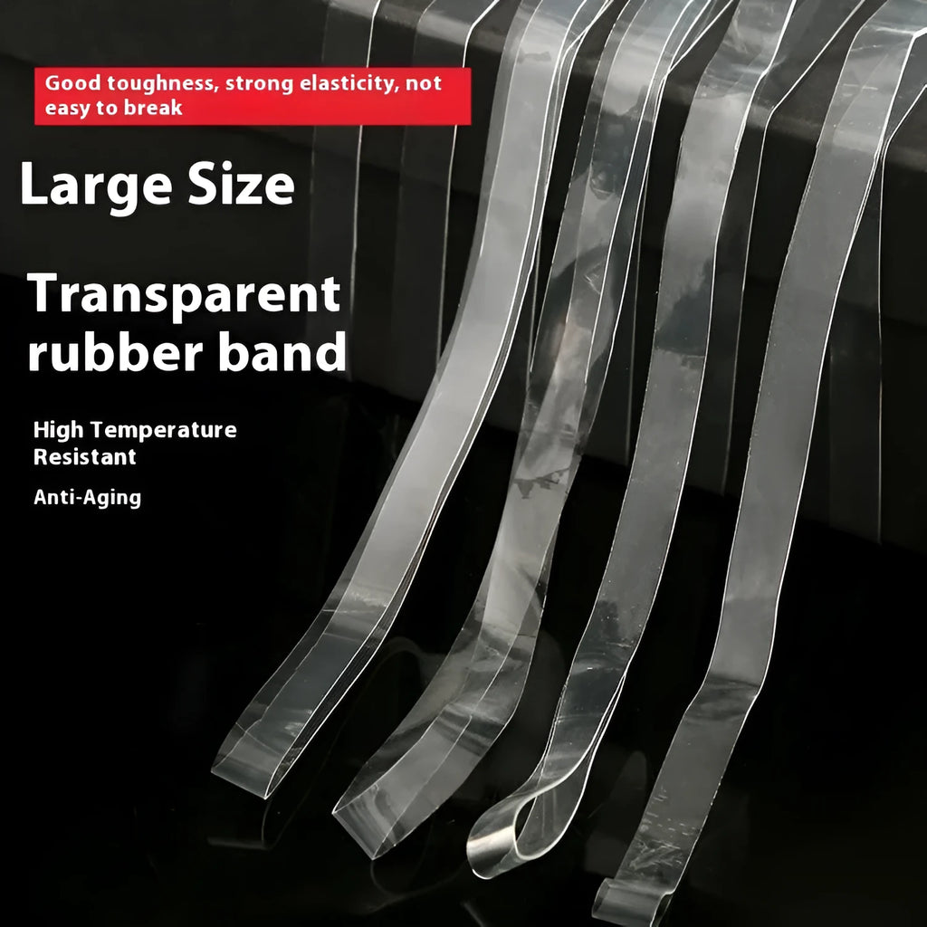 Transparent white TPU rubber bands of various sizes on a light surface
