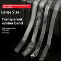 Transparent white TPU rubber bands of various sizes on a light surface