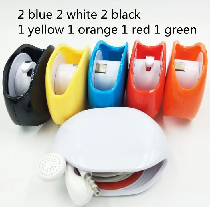 Automatic earphone cable winder retractor in a compact plastic case.