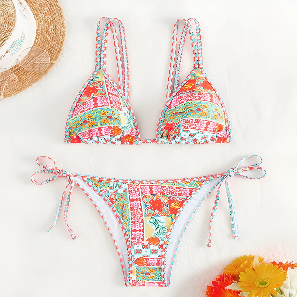 Women's lace-up front split-leg swimsuit in picture colour with brief style bottoms