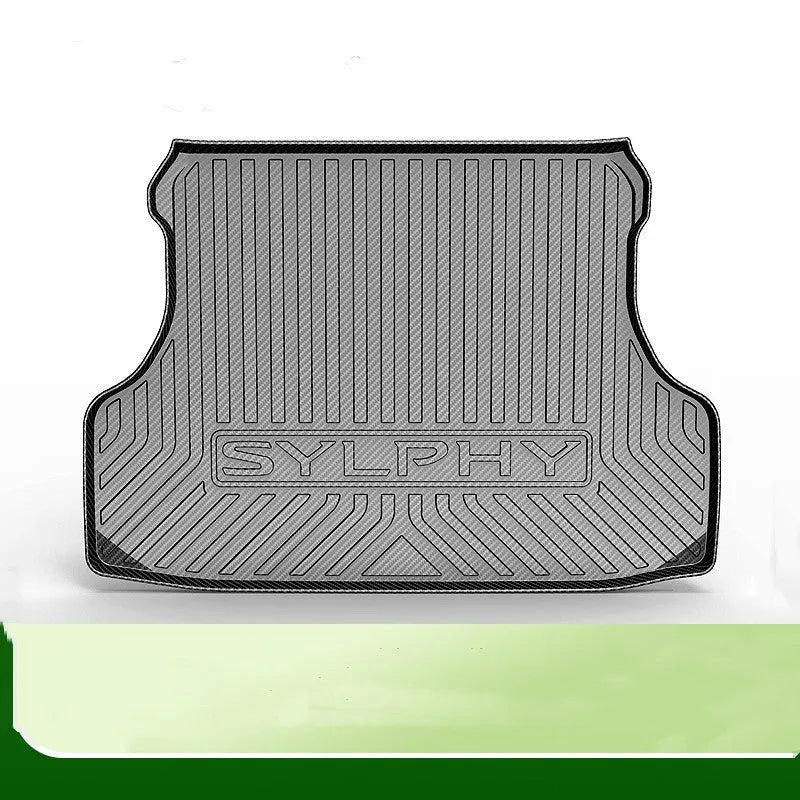 Black TPE car trunk pad with carbon fibre pattern installed in vehicle tailbox