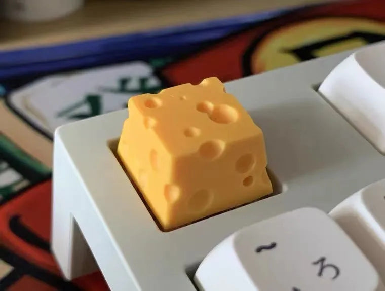 Yellow resin cheese-themed keycap for mechanical keyboards with detailed sculpting
