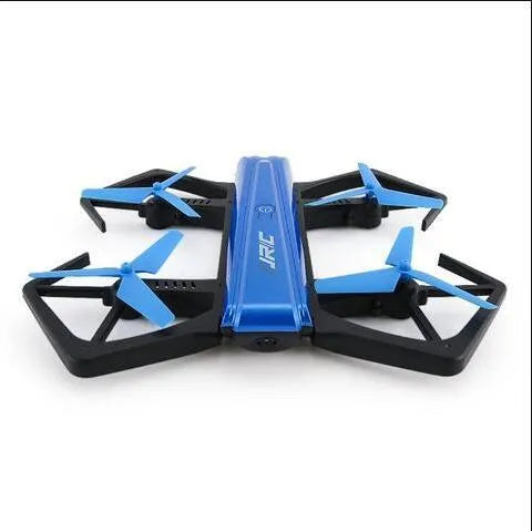 White JJRC H43WH folding drone with four arms deployed and propellers attached outdoors
