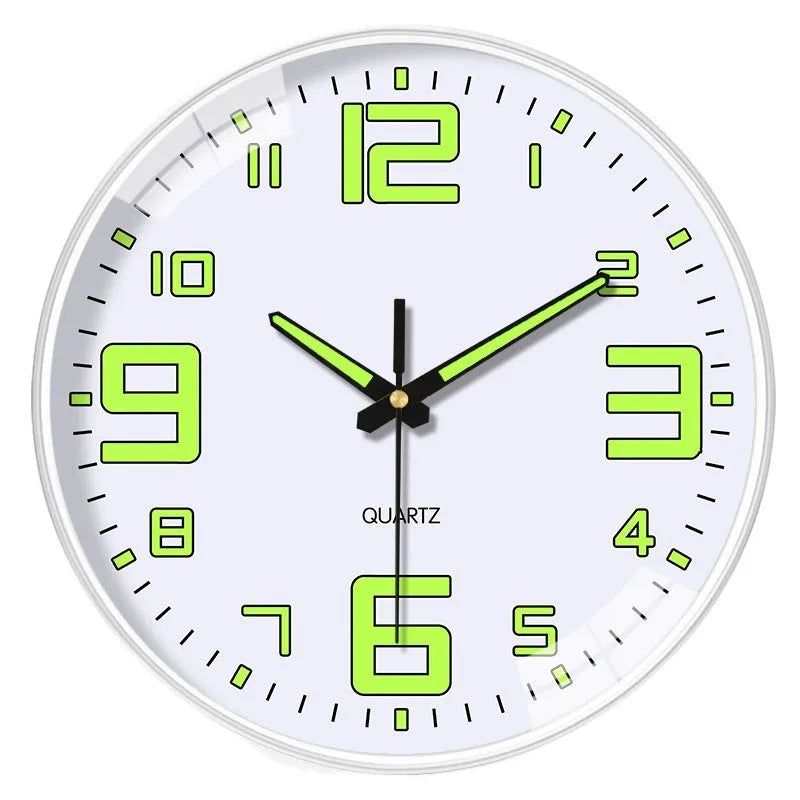 8 inch diameter modern wall clock with luminous hands on a wall.