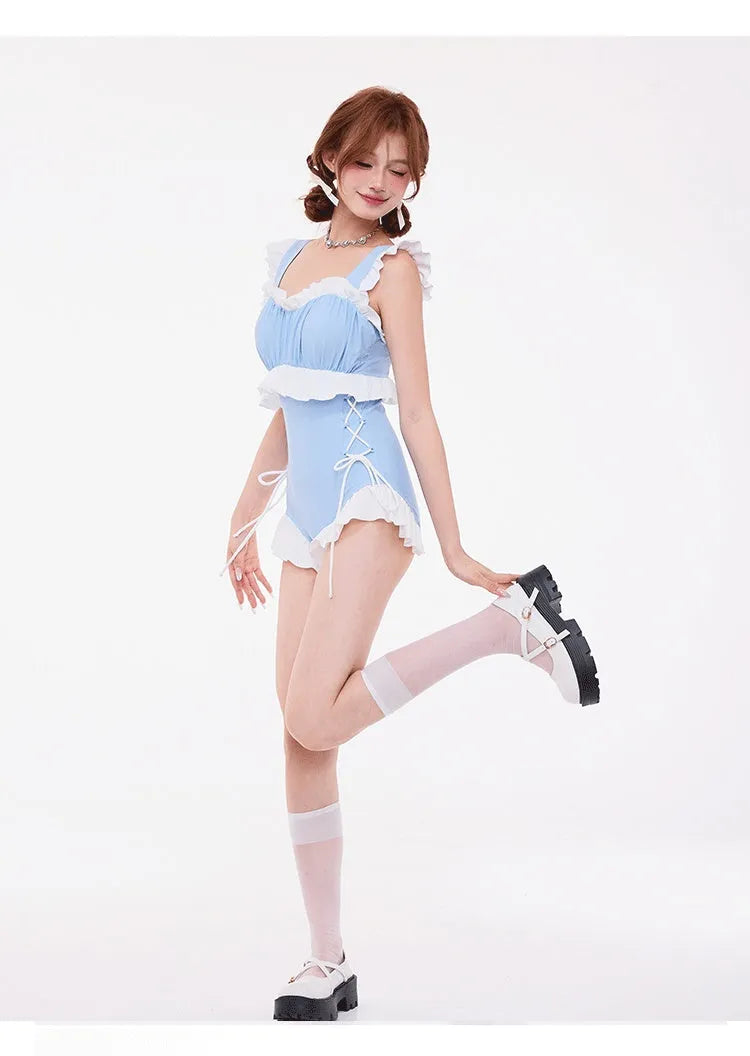 Light blue women's one-piece swimsuit with lace trim and a high-waisted, backless slim fit.