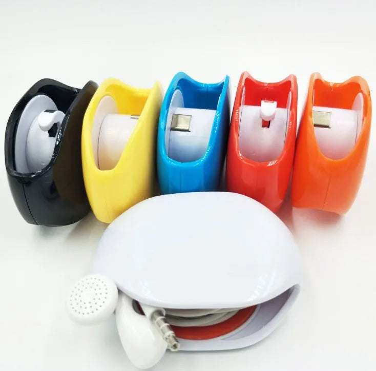 Automatic earphone cable winder retractor in a compact plastic case.