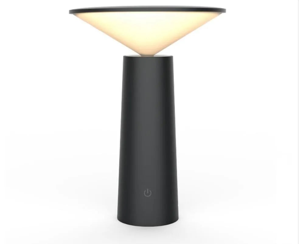 Black USB rechargeable table lamp with touch sensor and adjustable LED reading light head on a desk.