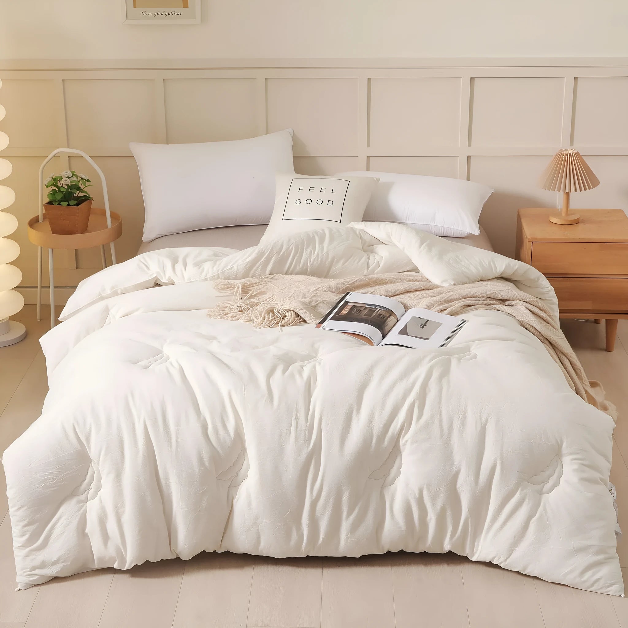 Soybean fibre filled pure cotton quilt in grey, shown on a bed in a 150x200cm size.