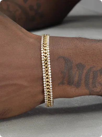 Gold tennis bracelet with titanium steel construction and artificial gemstone inlay on wrist